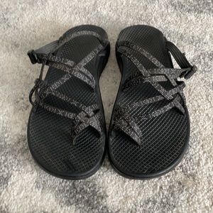 Chaco black and white outdoor hiking sandals.